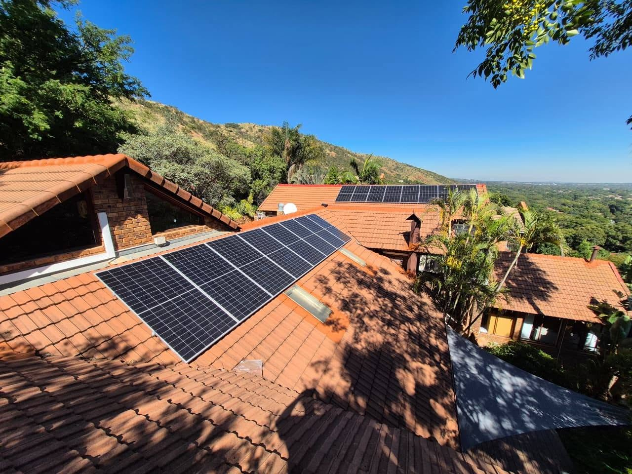 Rooftop solar array with mountain view in Gauteng